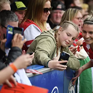 Arsenal Women's Player Steph Catley Interacts with Fan after Chelsea Match