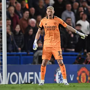 Arsenal's Aaron Ramsdale Stands Firm: A Heroic Performance Against Chelsea at Stamford Bridge (Premier League 2021-22)