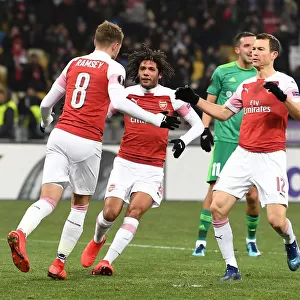 Arsenal's Aaron Ramsey, Mohamed Elneny, and Stephan Lichtsteiner Celebrate Goals Against Vorskla Poltava in Europa League