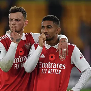 Arsenal's Ben White and Reiss Nelson: Celebrating Victory Over Wolverhampton Wanderers in the 2022-23 Premier League