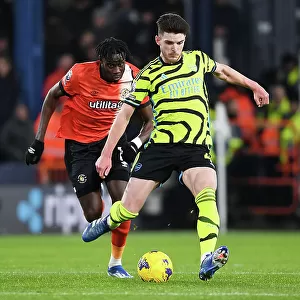 Arsenal's Declan Rice in Action against Luton Town in the Premier League (2023-24)