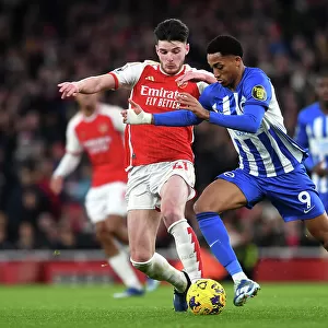 Arsenal's Declan Rice Tackles Joao Pedro in Premier League Clash Against Brighton & Hove Albion (2023-24)