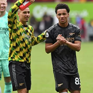 Arsenal's Ethan Nwaneri and Gabriel Martinelli Celebrate Euphoric Victory with Fans at Brentford