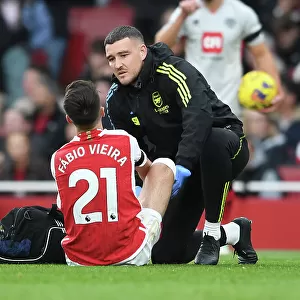 Arsenal's Fabio Vieira Receives Treatment: Arsenal FC vs Sheffield United, 2023-24 Premier League