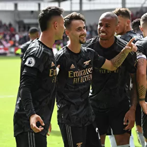 Arsenal's Fabio Vieira and Teammates Celebrate Goal Against Brentford in 2022-23 Premier League
