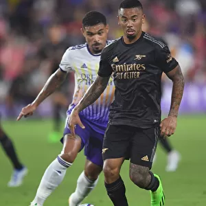 Arsenal's Gabriel Jesus Faces Off Against Orlando City SC's Junior Urso in Pre-Season Clash
