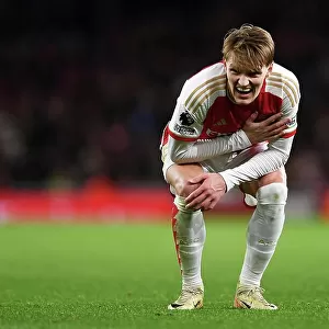 Arsenal's Martin Odegaard Reacts to Injury During Arsenal v West Ham United (2023-24)