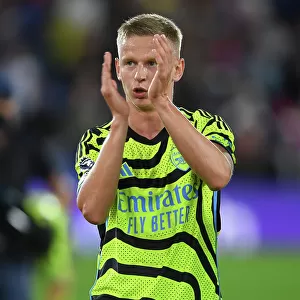 Arsenal's Oleksandr Zinchenko Celebrates with Fans after Crystal Palace Victory, 2023-24 Premier League