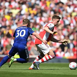 Arsenal's Rob Holding Outmuscles Leeds Joel Gelhardt in Intense Premier League Clash