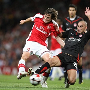 Arsenal's Rosicky vs. Ledesma: Arsenal's 2-0 Victory Over Olympiacos in the UEFA Champions League, Emirates Stadium, 2009
