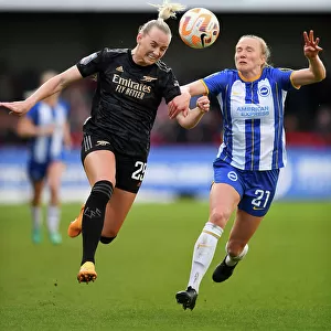 Arsenal's Stina Blackstenius Faces Pressure from Brighton's Zoe Morse in FA Women's Super League Clash