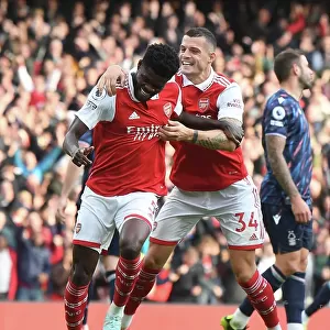 Arsenal's Thomas Partey and Granit Xhaka Celebrate Goals Against Nottingham Forest (2022-23)