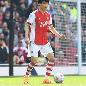 Arsenal's Tomiyasu in Action: Arsenal vs Manchester United, Premier League 2021-22, Emirates Stadium