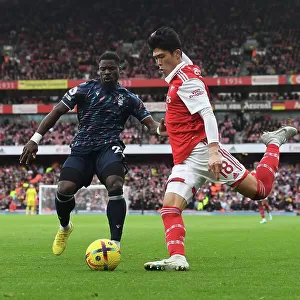 Arsenal's Tomiyasu Outmaneuvers Aurier in Premier League Clash vs. Nottingham Forest