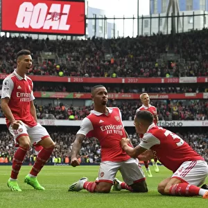 Arsenal's Unstoppable Trio: Jesus, Martinelli, and Xhaka Celebrate Double Strike Against Tottenham in the 2022-23 Premier League