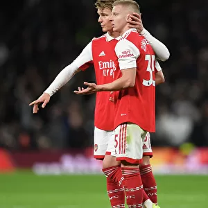 Arsenal's Zinchenko and Odegaard in Action against Tottenham in Premier League Clash (2022-23)