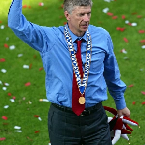 Arsene Wenger the Arsenal Manager celebrates at the end of the match