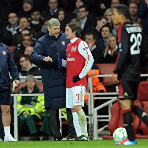 Arsene Wenger Motivates Tomas Rosicky: Arsenal's 3-0 Victory Over AC Milan in the UEFA Champions League