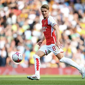 Charging Ahead: Martin Odegaard Leads Arsenal Past Wolverhampton Wanderers in the 2022-23 Premier League
