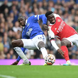 Clash at Goodison Park: Nketiah vs. Doucoure - Everton vs. Arsenal, Premier League 2023-24