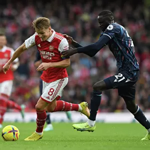 Clash of the Midfield Titans: Odegaard vs. Kouyate - Arsenal vs. Nottingham Forest Showdown