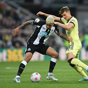 Clash at St. James Park: Martin Odegaard vs Bruno Guimaraes in Newcastle United vs Arsenal Premier League Encounter