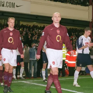 Dennis Bergkamp and Pascal Cygan (Arsenal) walk out onto the pitch