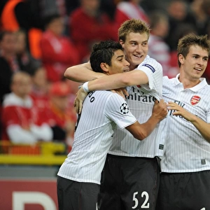 Eduardo, Bendtner, and Ramsey: Celebrating Arsenal's 3rd Goal Against Standard Liege in the UEFA Champions League