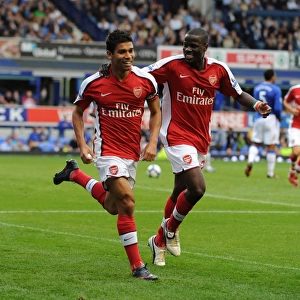 Eduardo celebrates scoring the 6th Arsenal goal with Emmanuel Eboue
