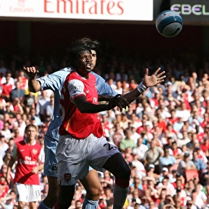 Emmanuel Adebayor (Arsenal) Javier Garrido (Man City)
