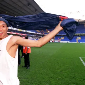 Gael Clichy (Arsenal) celebrates winning the league