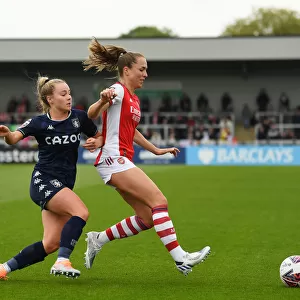 Intense Battle: Arsenal Women vs. Aston Villa Women in FA WSL Clash (2021-22)
