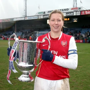 Jayne Ludlow (Arsenal) with the League Cup Trophy