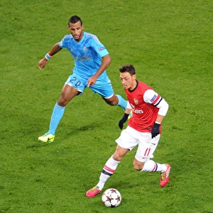 Mesut Ozil vs Alaixys Romao: Intense Battle at Arsenal v Marseille, UEFA Champions League (2013-14)