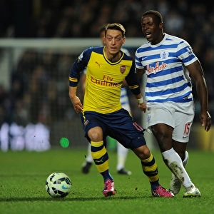 Mesut Ozil vs Nedum Onuoha: Intense Clash Between Queens Park Rangers and Arsenal in the Premier League
