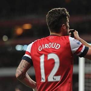 Olivier Giroud's Double: Thrilling Arsenal Victory Over West Ham United in the Premier League (April 2014)