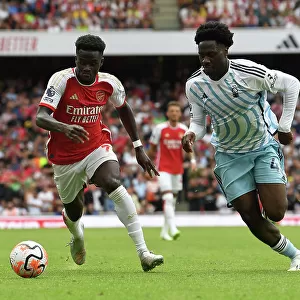Saka vs. Aina: Intense Face-Off in Arsenal's 2023-24 Premier League Clash Against Nottingham Forest