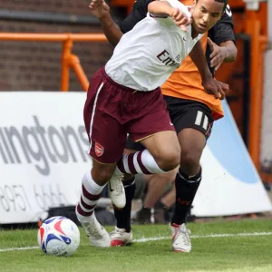 Theo Walcott (Arsenal) Sagi Burton (Barnet)