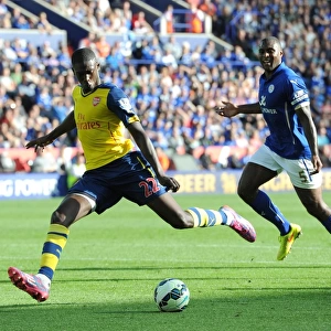 Yaya Sanogo (Arsenal) Wes Morgan (Leicester). Leicester City 1: 1 Arsenal. Barclays Premier League