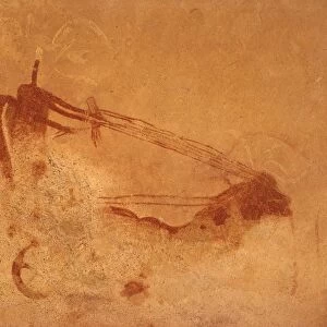 Algeria, Sahara Desert, Tassili-n-Ajjer National Park, Rock carvings depicting Garamantes cart