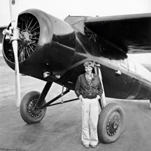 Amelia Earhart And Her Plane