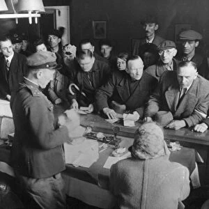 Captain kazakov receiving german civilians in the soviet military commandants office in weissensee district, 1945