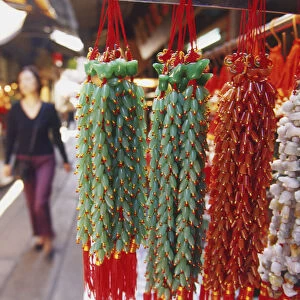 China, Hong Kong, Guangzhou, strings of jade at the Jade Market