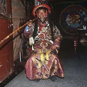 China, Yunnan, Lijiang, man in traditional Naxi costume