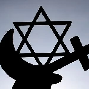 Christianity, Islam, Judaism 3 monotheistic religions. Jewish Star, Cross and Crescent : Interreligious symbols in hands