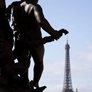 The Eiffel Tower, Paris, with statues on the Place de la Concorde