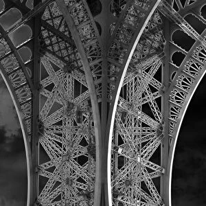 The Eiffel Tower: detail and sky bw