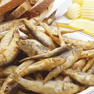 Fried whitebait, served with sliced bread and butter