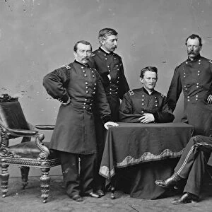 General Philip Sheridan (1831-1888), standing right, and his Staff officers during