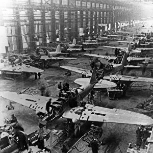 Il-2 sturmovik attack aircraft being built at a factory in the ussr during world war ll